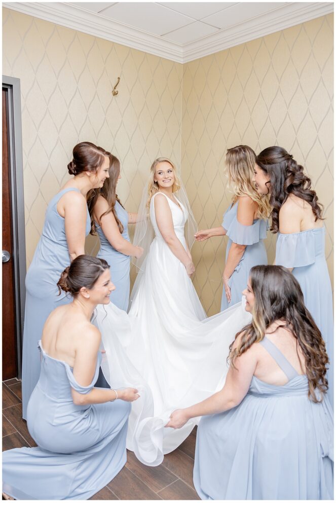 bride and bridesmaids getting ready