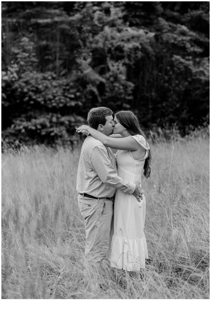 black and white image of engaged couple 