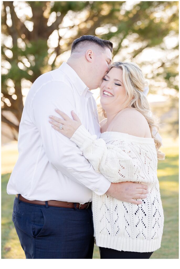 engaged couple laughing 