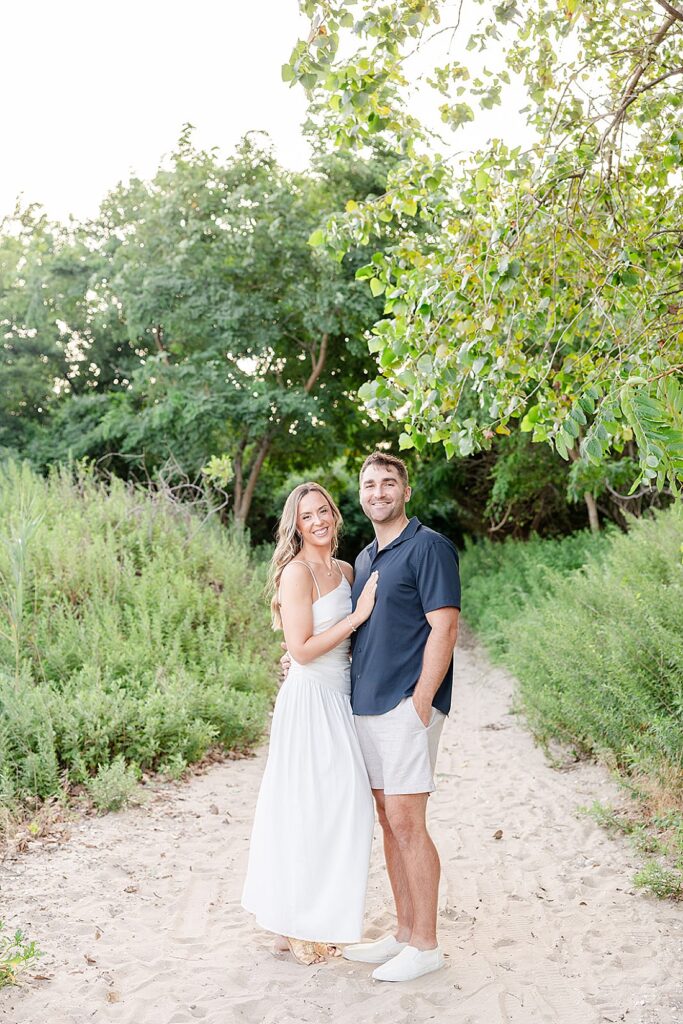 Discover Kate & Matt’s romantic Hoboken engagement session and Point Pleasant, New Jersey. From a cozy first date to a dreamy Santorini proposal, see their love story before their wedding at Crystal Point Yacht Club.