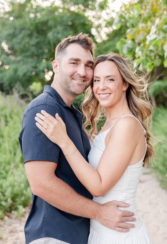 Discover Kate & Matt’s romantic Hoboken engagement session and Point Pleasant, New Jersey. From a cozy first date to a dreamy Santorini proposal, see their love story before their wedding at Crystal Point Yacht Club.