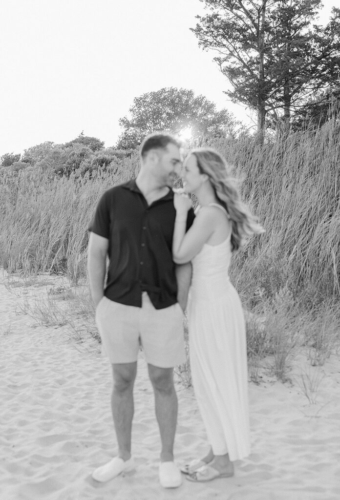 Discover Kate & Matt’s romantic Hoboken engagement session and Point Pleasant, New Jersey. From a cozy first date to a dreamy Santorini proposal, see their love story before their wedding at Crystal Point Yacht Club.