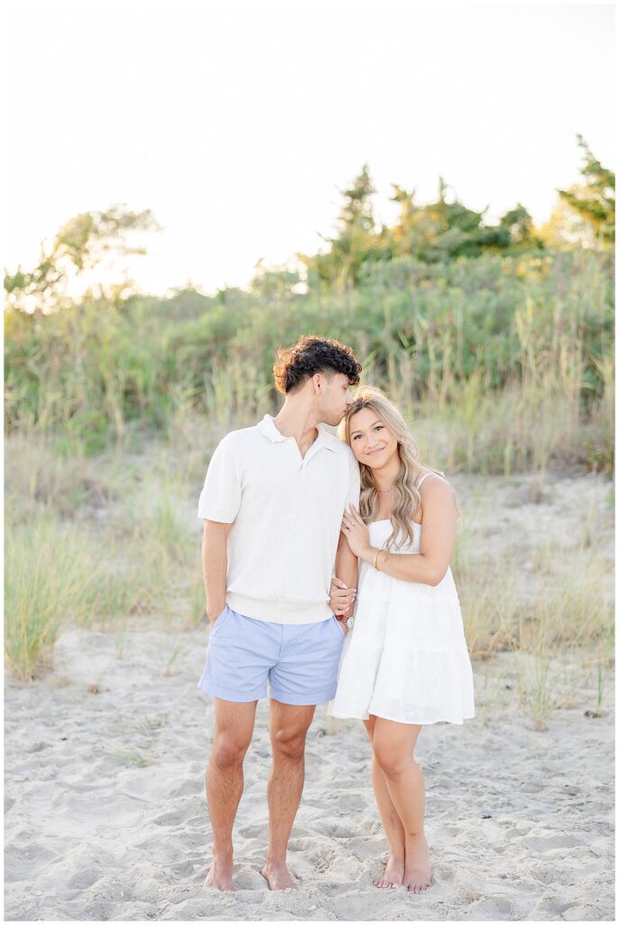 Engagement photos at Fisherman’s Cove in Manasquan, NJ with soft summer beach light