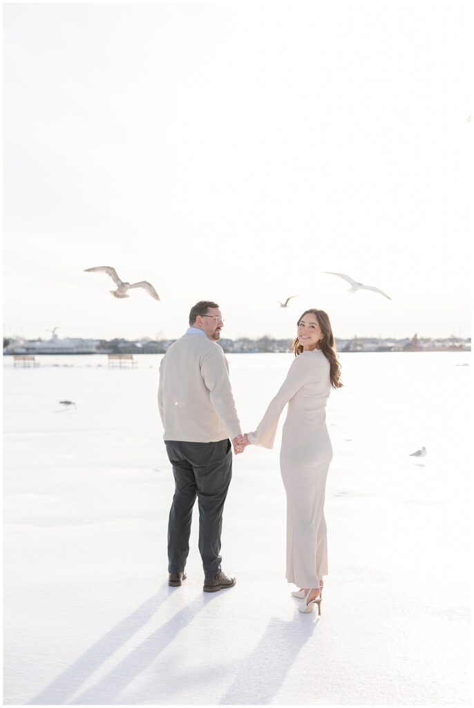 Winter engagement photos at Manasquan Beach in New Jersey